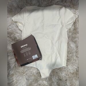 NIB Skims Raw Hem  T-Shirt Bodysuit
